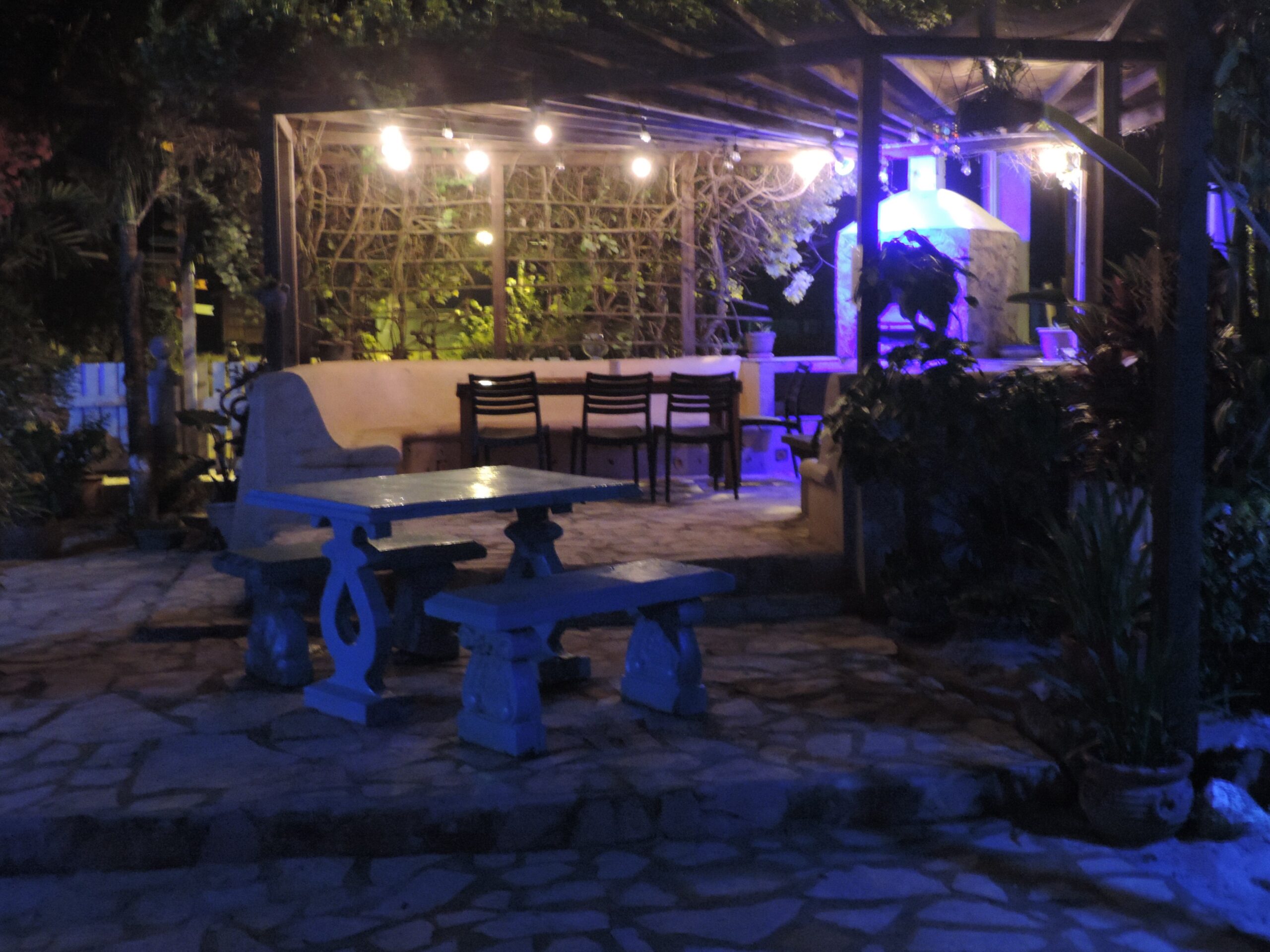 Night time view of Beautiful Courtyard at All Seasons All Seasons Belize
